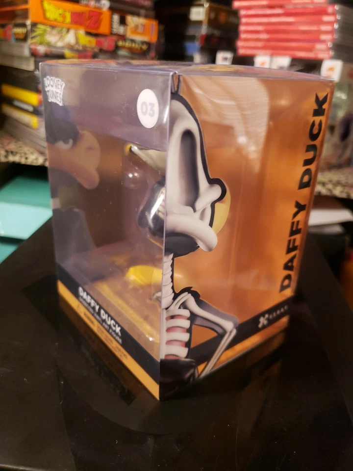 Figura de arte de vinilo XXRAY Looney Tunes Pato Lucas visión 4D por Jason Freeny Foto 3 de 4