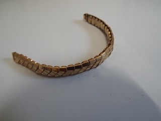 EXCALIBUR 9K GOLD BK & FT WATCH BRACELET.