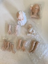 Lot of Porcelain Santa Heads And Arms. Doll Arms And Head 19 Pieces Total