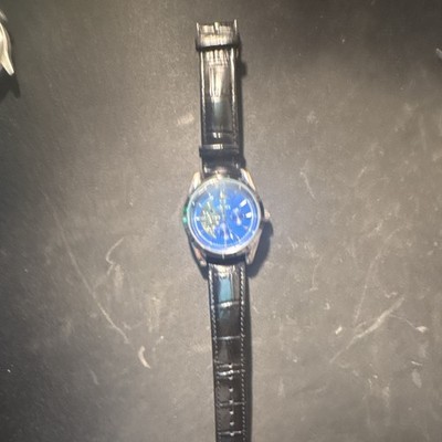 Analog Blue Dial Automatic Roman Numerals SS Exhibition Back 42mm Leather