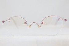 NEW VINTAGE TITANIUM WIRE RIMLESS EYEGLASSES BRILLE