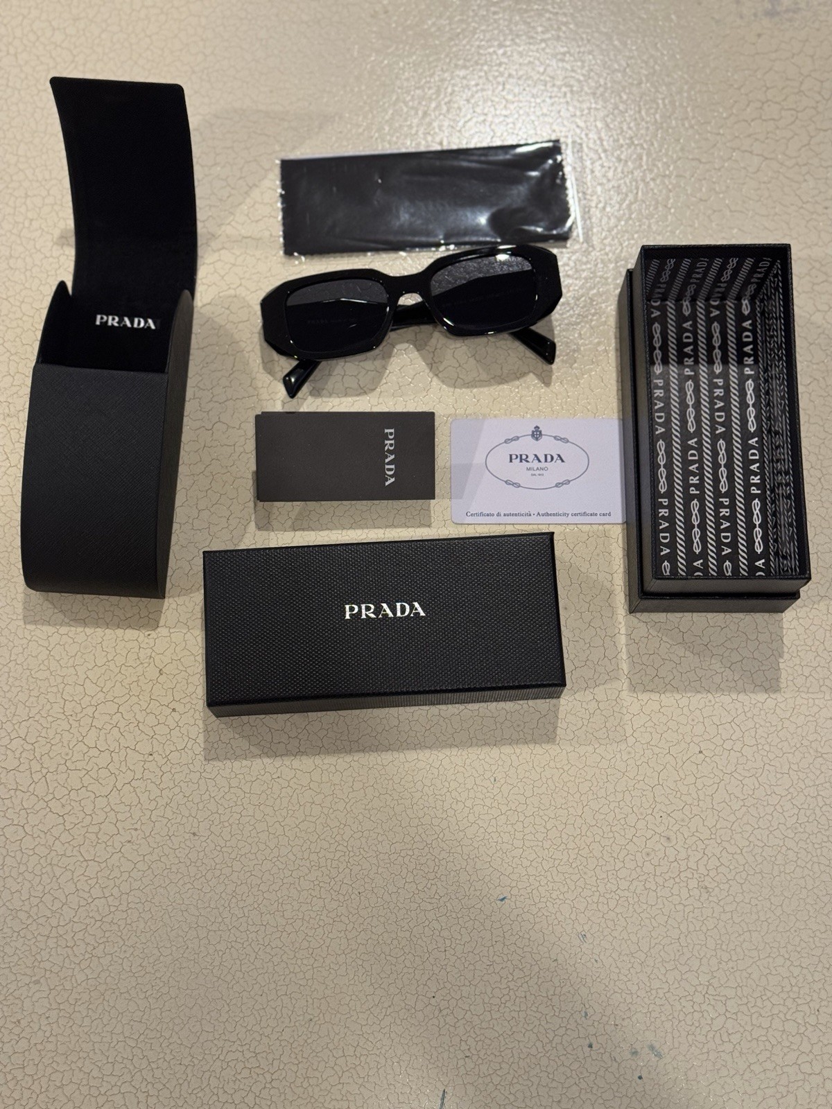 Prada PR17WS Black Frame Sunglasses with Dark Lenses - Free Shipping.