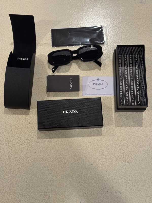Prada PR17WS Black Frame Sunglasses with Dark Lenses - Free Shipping.