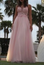 Abito elegante da cerimonia color rosa con brillantini