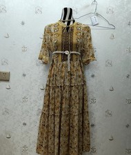 100% Mulberry Silk dress Comes without a belt.