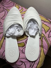 Tory Burch mules.