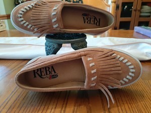 justin moccasin boots