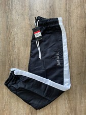 nike repeat taped poly pant black 