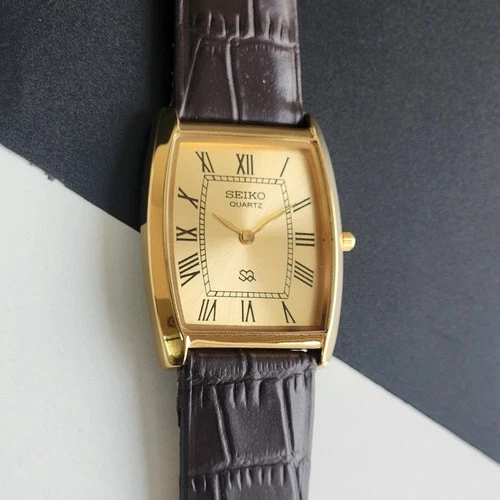 Vintage Seiko Slim Tank Quartz Men Golden Dial Dress Watch-Free Shipping