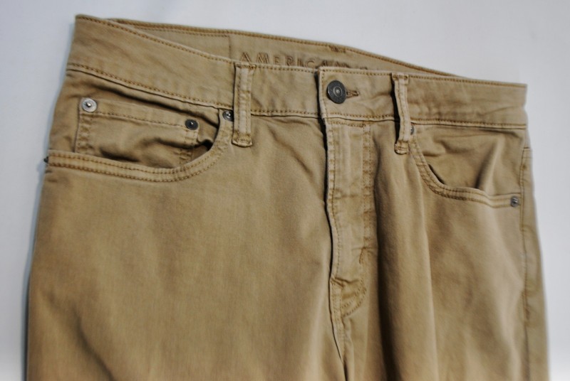 AMERICAN EAGLE OUTFITTERS AIR FLEX SLIM, W31 L34 KHAKI JEANS