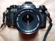 Canon AE-1 Program Black SLR + FD 50mm f/1.8 S.C. Lens Working Squeal