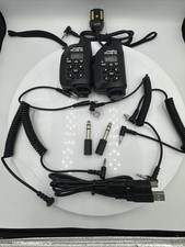 Lot of 2 Pocket Wizard Plus III Flash Trigger Transceivers with accessories.