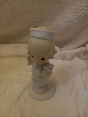Precious Moments Nurse Angel Of Mercy With Flowers Enesco 1986 102482