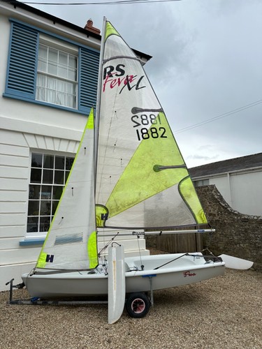 RS Feva XL Race sailing dinghy with launch trailer