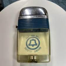 Vintage scripto vu lighter Pacific Northwest Bell Safety Award logo