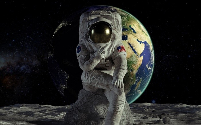 Toile tableaux astronaute pour décorer un salon moderne au style cosmos