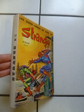 LUG /  RELIURE   STRANGE 12    / NUM   35  36  37      / 1972