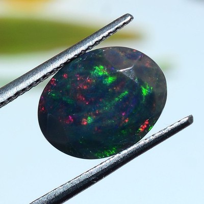 3.37 Cts Natürlich Äthiopische Schwarz Opal 12.94mmx9.98mm Oval Schnitt Locker