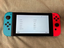 6586 ニンテンドースイッチ Nintendo Switch 32GB Handheld Console - Neon Red/Neon Blue for