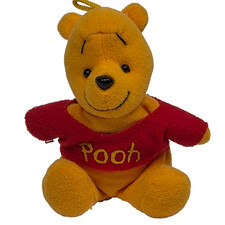 This is a vintage Disney Store Winnie the Pooh bear bean bag stuffed animal 3.5"