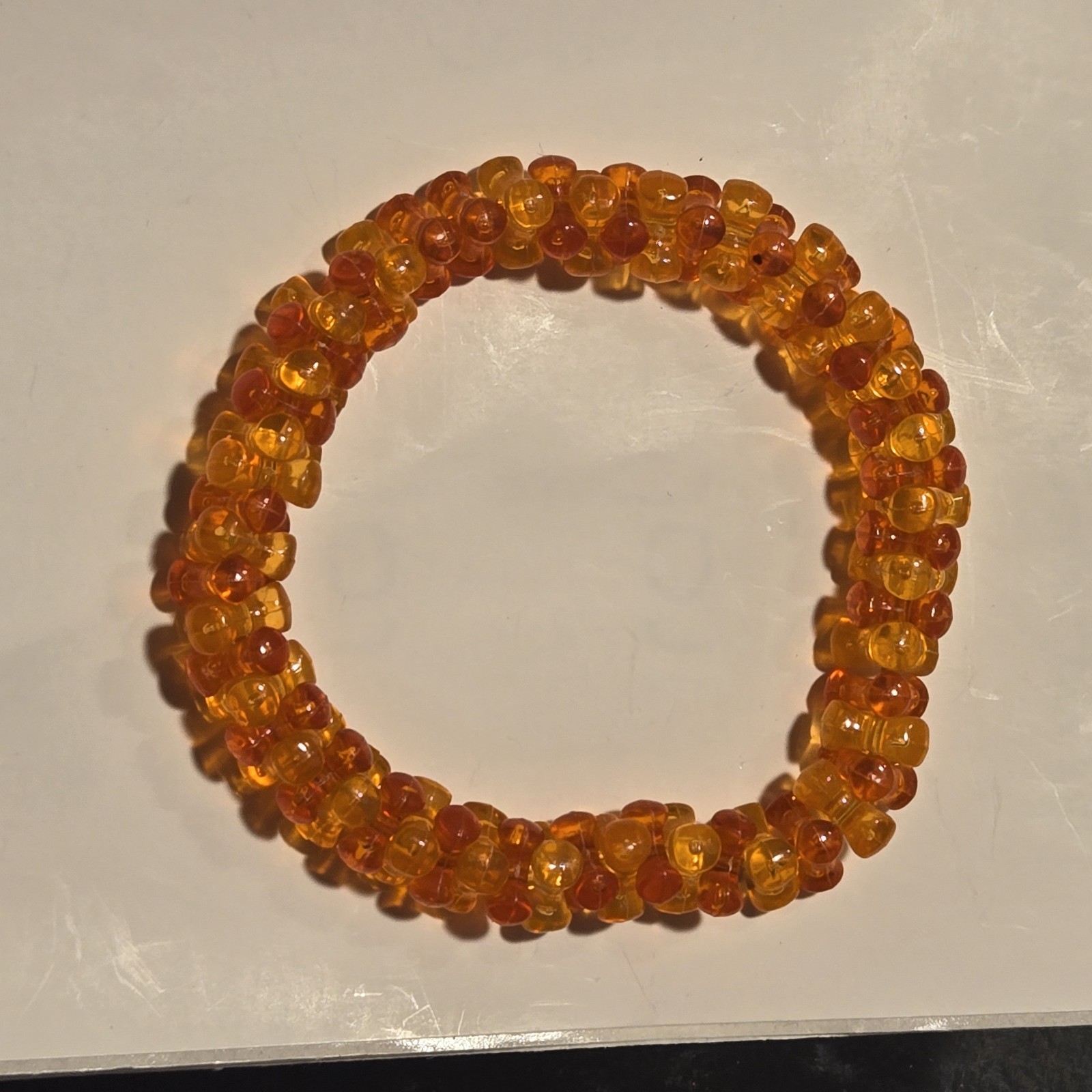 Vintage Translucent Orange Triangular Plastic Bea… - image 1