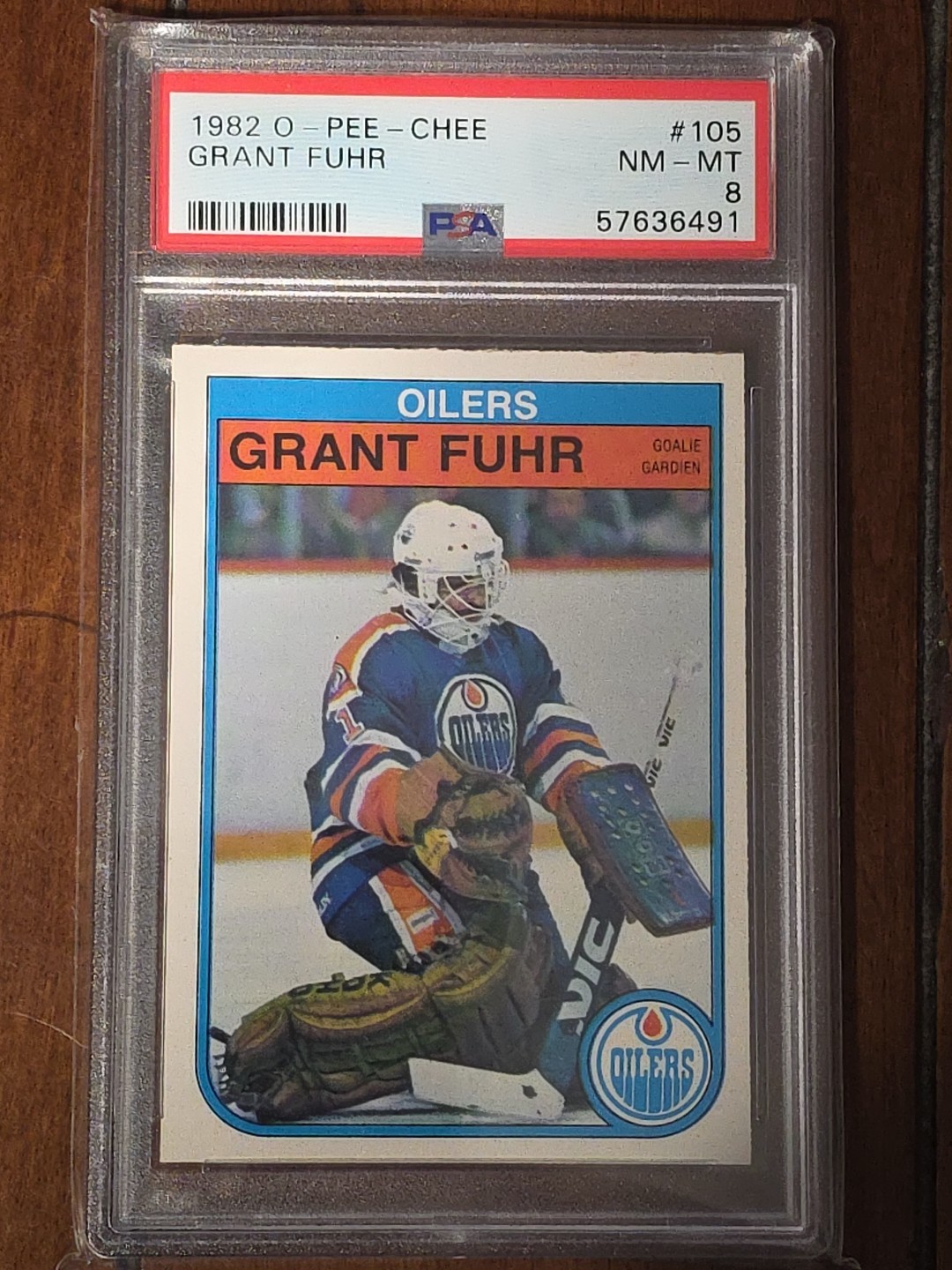1982-83 O-Pee-Chee Hockey #105 Grant Fuhr PSA 8 RC Rookie Oilers