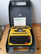 Schreibmaschine Olympia 440 TR gelb orange 70-er Jahre + Koffer + Anleitung