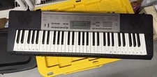 Casio LK-165 61-Key Electronic Light Up Keyboard  .