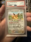 2025 POKEMON PRE EN-PRISMATIC EVOLUTIONS POKEMON DAY 2025 #074 EEVEE PSA 10