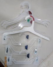 CLOTHS HANGERS..LOT OF 10...  CHILDS SIZE.. ..SHORT  NECK. ..CLEAR