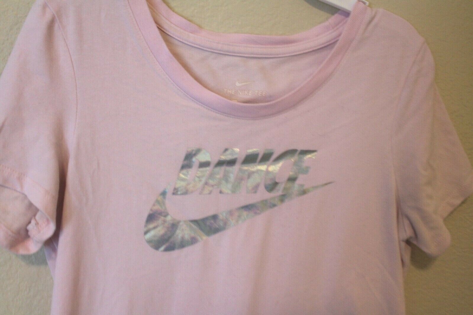 pastel pink nike shirt