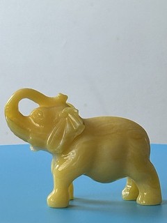 Vintage Faux Amber Elephant Figurine Butterscotch Egg Yolk