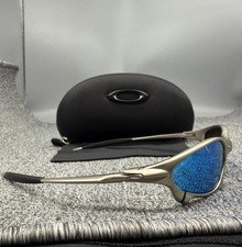 Oakley Penny  Juliet X-Mental Sunglasses Silver Frame POLARIZED Lake Blue Lens