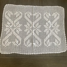 Vintage hand Crocheted White cotton doily 24.5 X 19.5 Measured In Center Areas