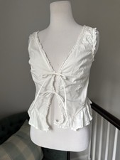 White cropped top with lace up detailSize S