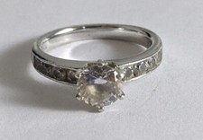 Sterling Silver 6mm Round Cut Clear Stone Solitaire Ring W/ Accents SZ 8.25