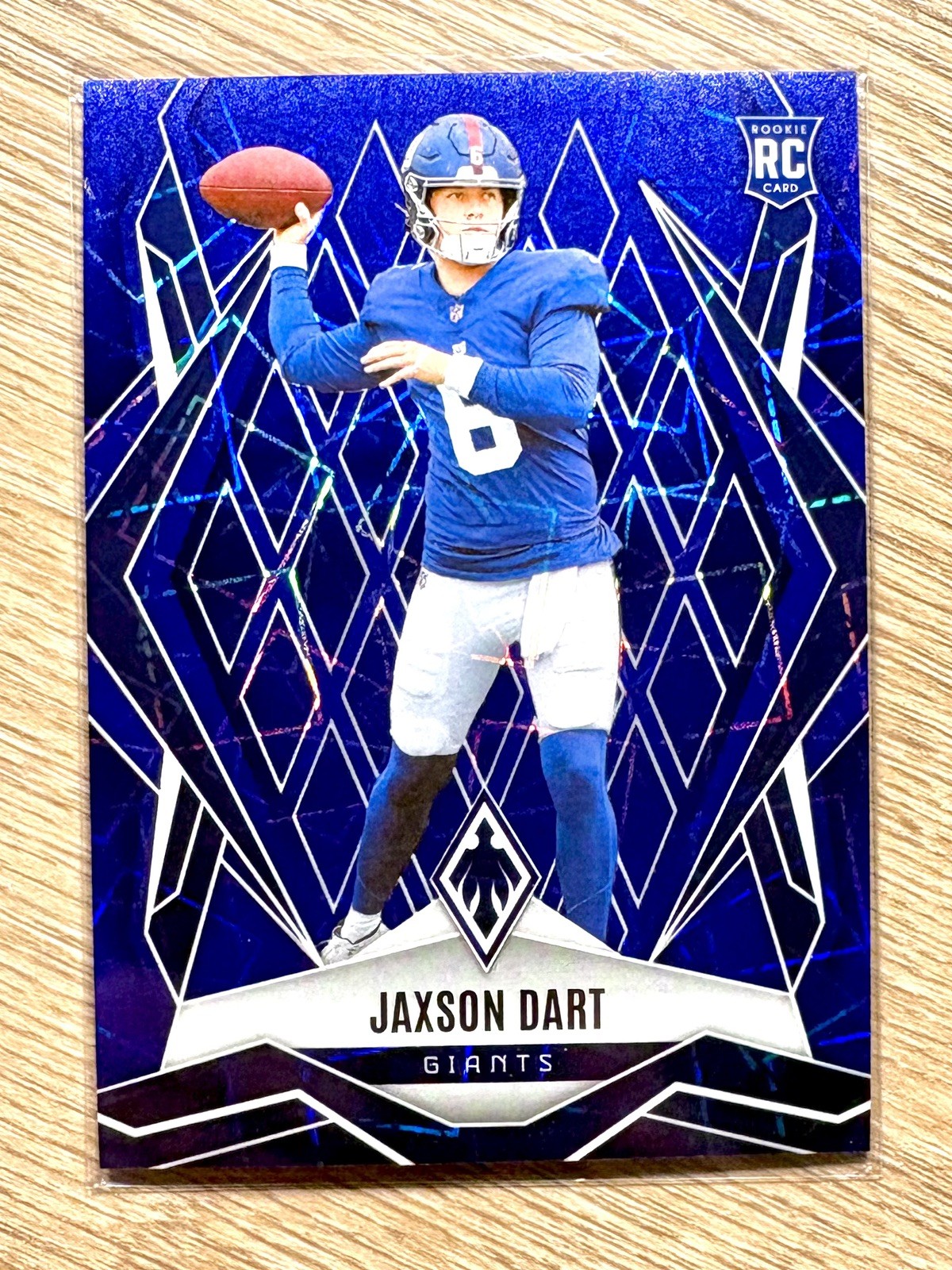 2025 Panini Phoenix Jaxson Dart Blue Lazer /75 (RC) #200 Rookie Giants