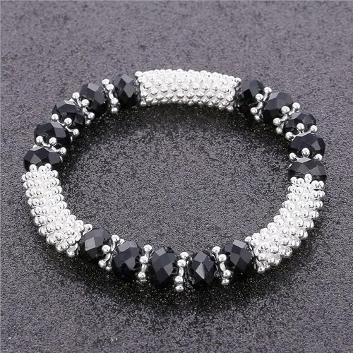 CRYSTAL BLACK RONDELLES AND SILVER PLATED DAISY BEADS STRETCH BRACELET - Picture 4 of 6