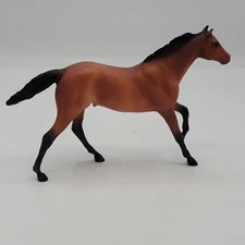 Small Plastic Bay Colored Horse Figurine Copyright B.M.C.