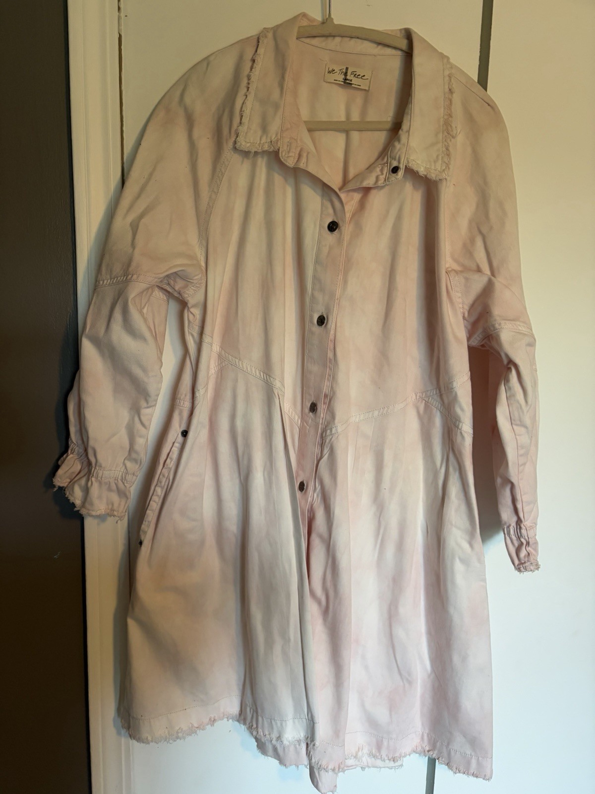 Free People We The Free Hannah denim mini dress in a faded pink wash. LG