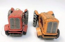 LOT OF 2 1950s Cragstan Stamped Tin Friction Toy Tractors Japan