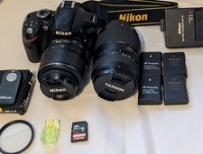 Nikon D3200 DSLR Camera 24.2MP with 2 lenses, tripod and camera bag many extras