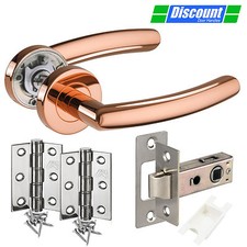 Door Handle Pack with Polished Copper Door Handles on Rose