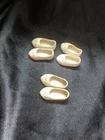 These are vintage Mattel Tutti doll shoes from the 1960s, specifically the white