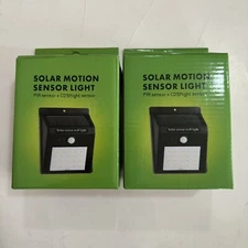 Solar Motion Sensor Light PIR Sensor + Cd5 Night Sensor Light 2 Pack New E34