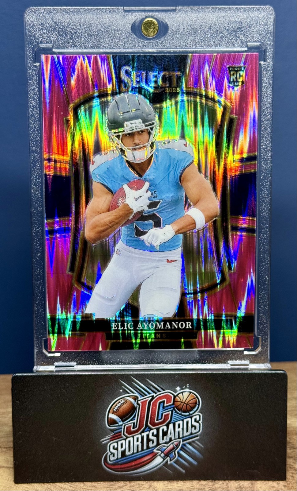 2025 Panini Select Premier Level Elic Ayomanor #127 Pink Shock Prizm (RC) Titans
