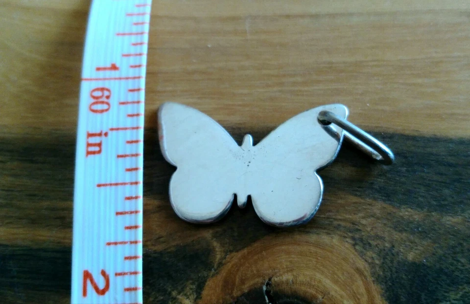 Hecho a mano 999. Colgante mariposa con acabado espejo de plata fina Foto 4 de 4
