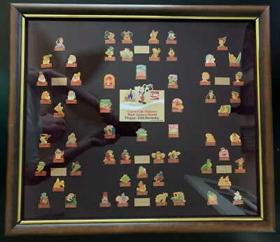 ディズニーワールド Coca-Cola Disney 15周年記念ピンセット Coca Cola Salutes Disney 15th Anniversary - 60 Pin Framed Set - In