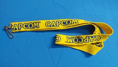 CAPCOM E3 HOLY GRAIL EXCLUSIVE FAT LANYARD BADGE HOLDER YELLOW & BLUE LOGO