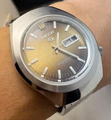 Montre à quartz vintage homme Ricoh Riquartz DX9 années 70 rare de collection - Photo 1/4
